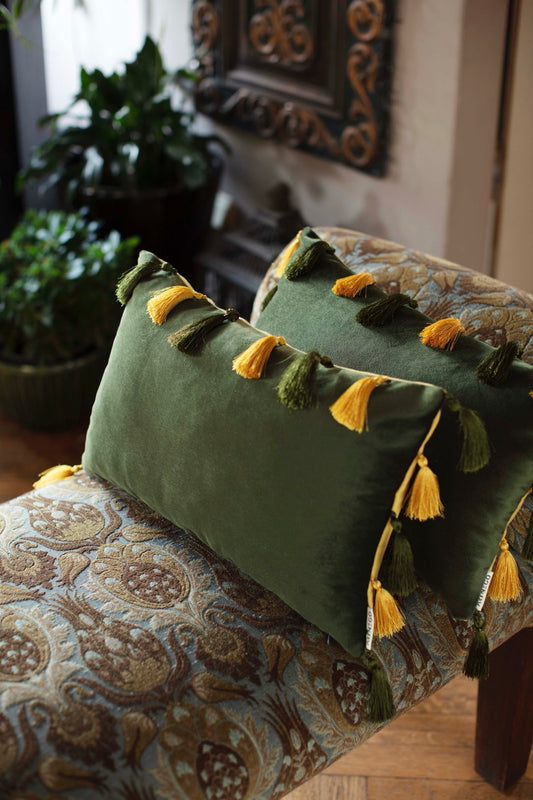 Green and Yellow Throw Pillow Cover with fringes on sofa 