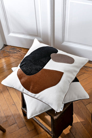 Minimalistic throw pillow cover with simple brown and black embroidered timeless design. Creating a timeless minimalistic interior design